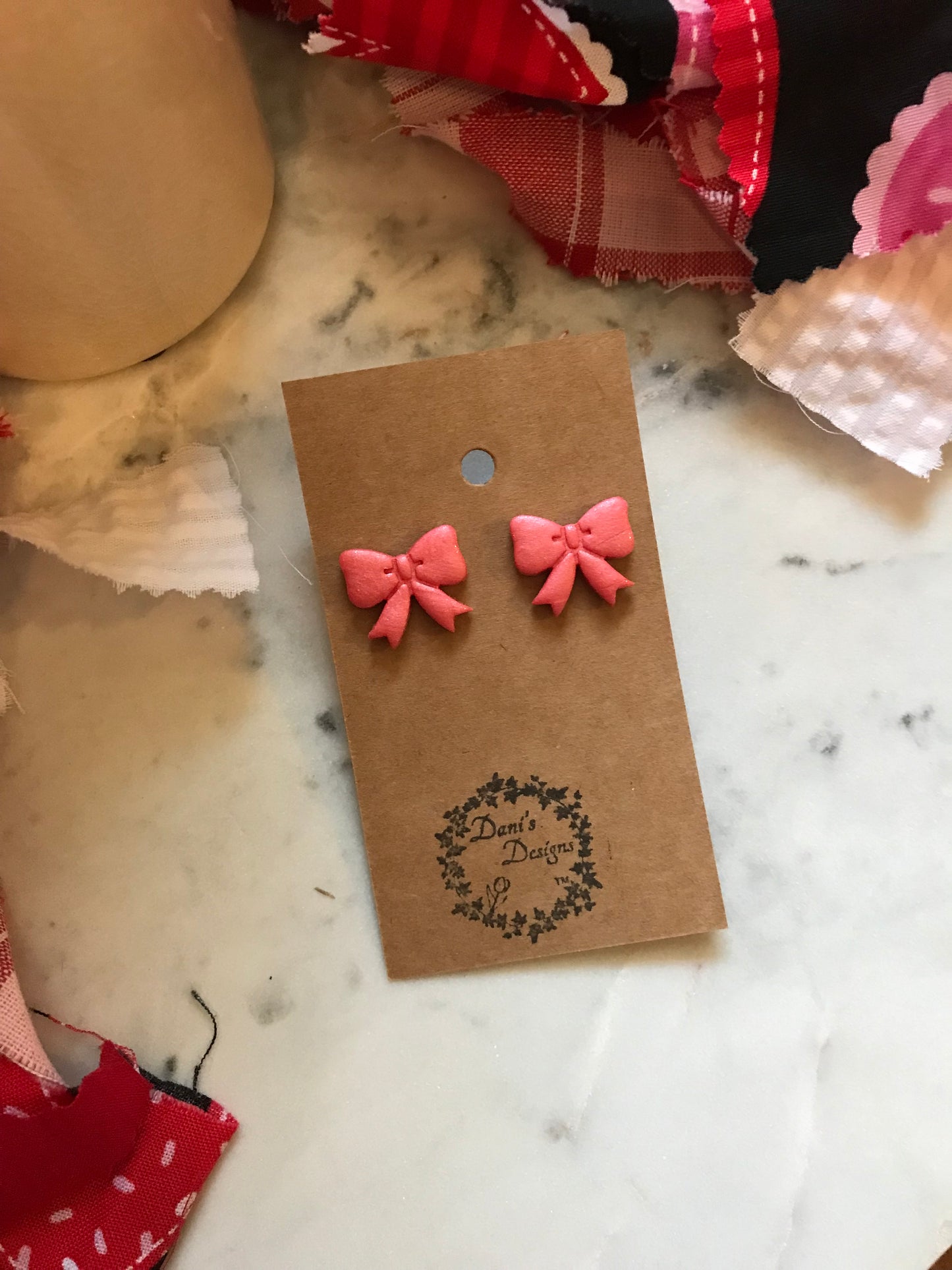 Pearl Pink Bow Studs