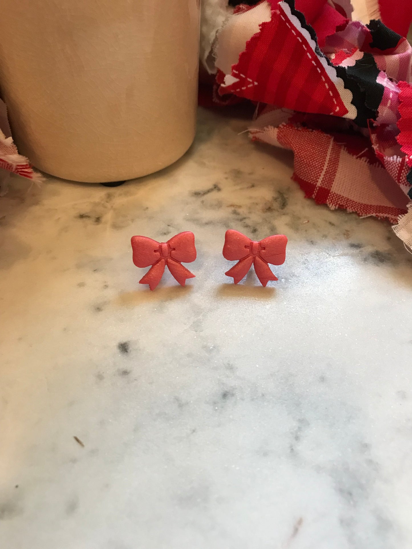 Pearl Pink Bow Studs